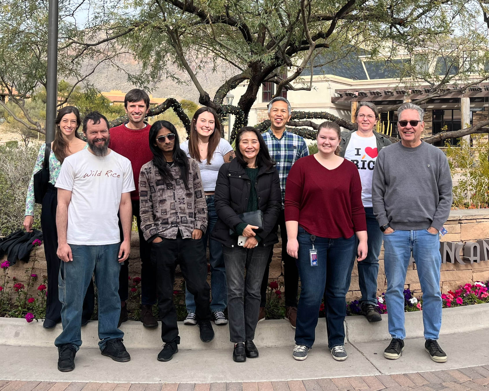 A picture of AGI group at La Encantada, Jan 5 2024.  Cassie, Chandler, Dario, Michael, Kacy, Seunghee, Jayson, Rowan, Tiffany, Rod